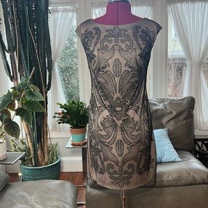 Sleeveless beaded dress by Alexia Admor